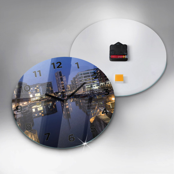 Round glass wall clock The city lit up at night