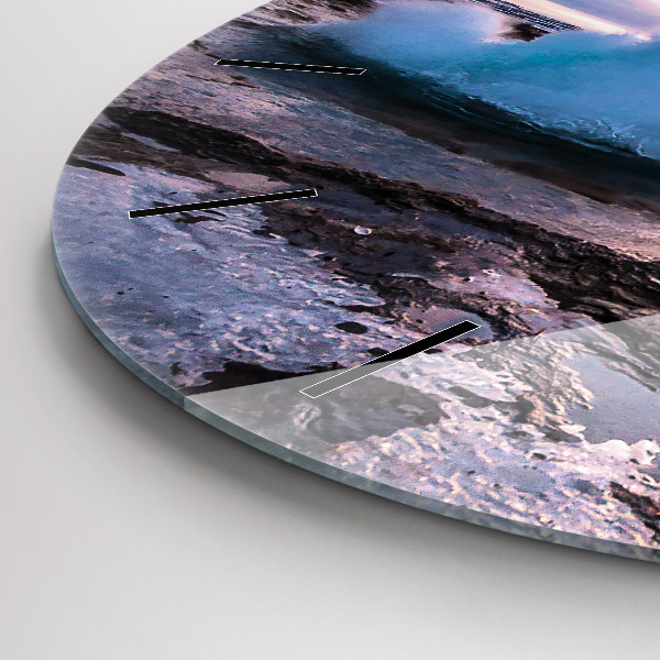 Round glass wall clock Geyser on the island of Iceland