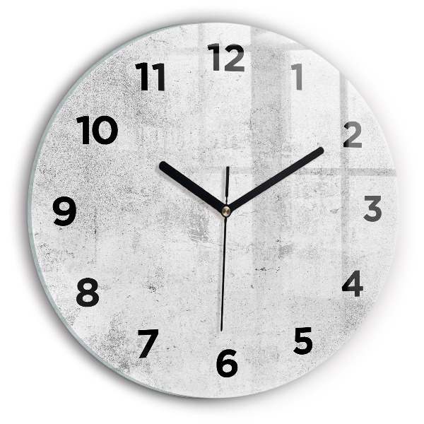 Round glass wall clock Concrete wall