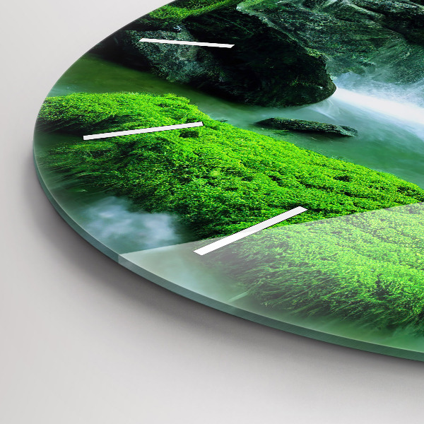 Round glass wall clock Waterfall among the moss