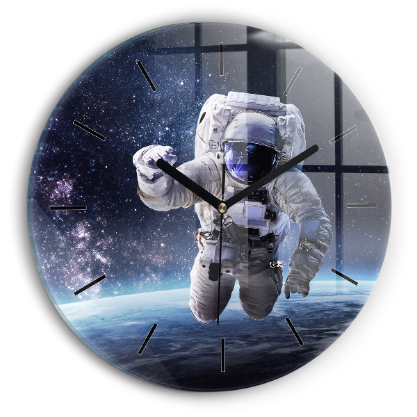 Round glass wall clock Astronaut above the earth