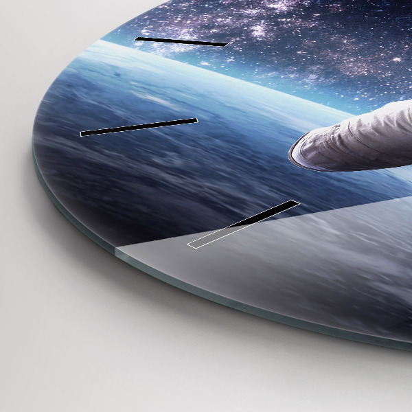 Round glass wall clock Astronaut above the earth