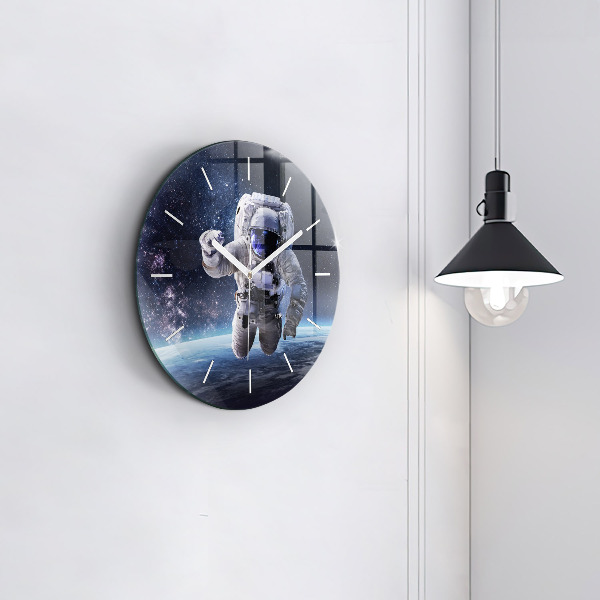 Round glass wall clock Astronaut above the earth