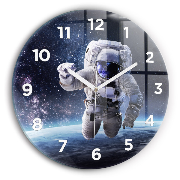 Round glass wall clock Astronaut above the earth