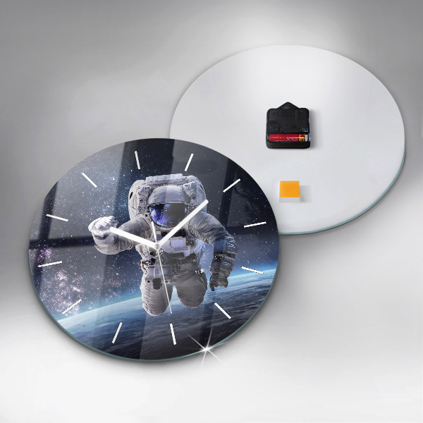 Round glass wall clock Astronaut above the earth
