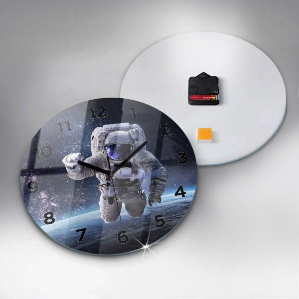 Round glass wall clock Astronaut above the earth