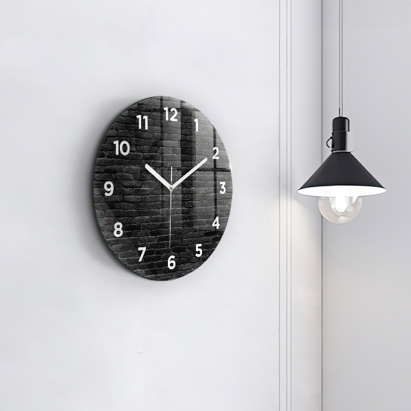 Round glass wall clock Dark brick wall
