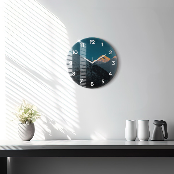 Round glass wall clock Sunset in the mountains